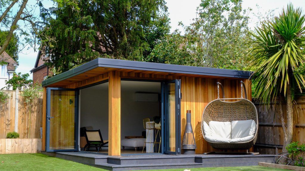 Modern garden room with a comfortable chair outside