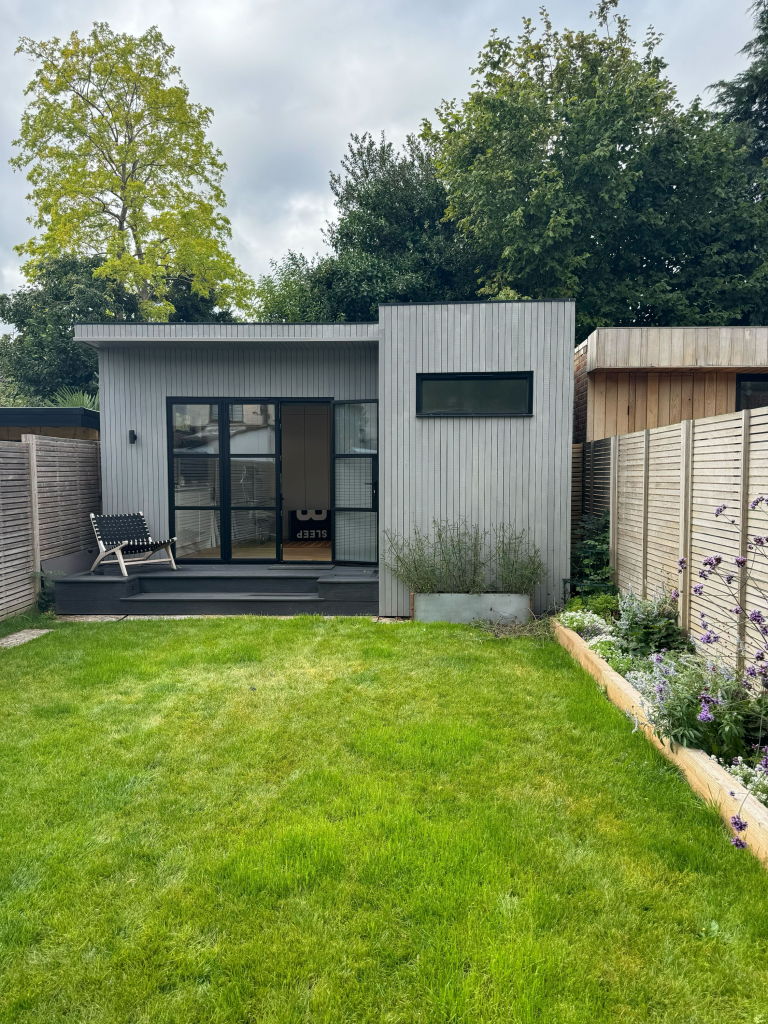 Modern garden room exterior in a landscaped garden